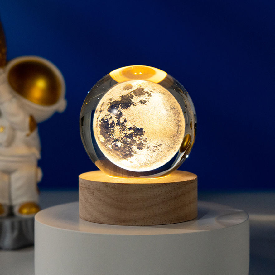 Moon lamp on a wooden base with a blue background