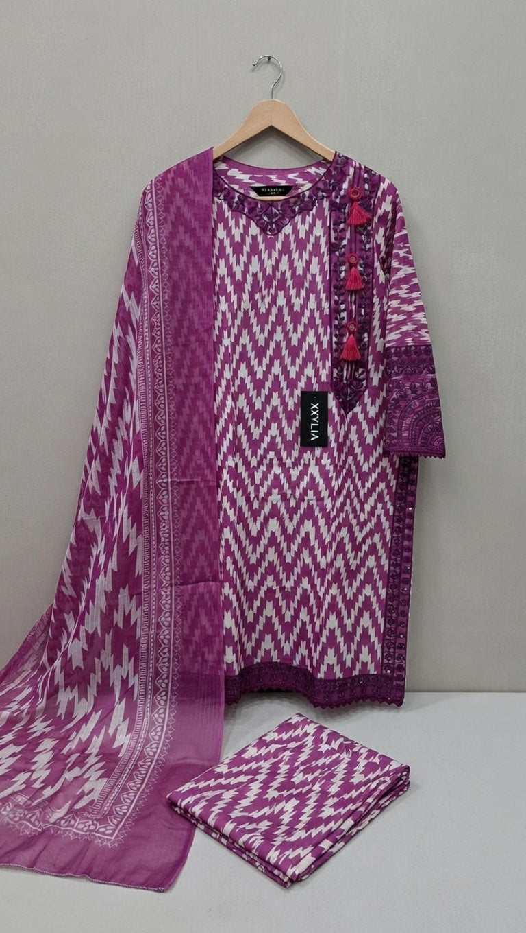 Purple and white patterned fabric on a hanger against a gray background
