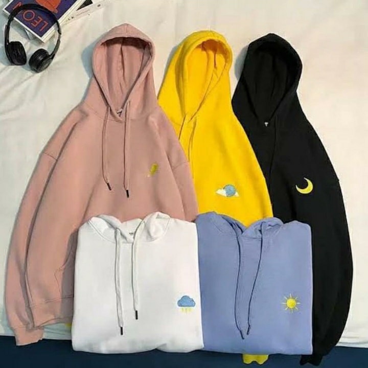 Five hoodies in different colors with embroidered designs on a white background.