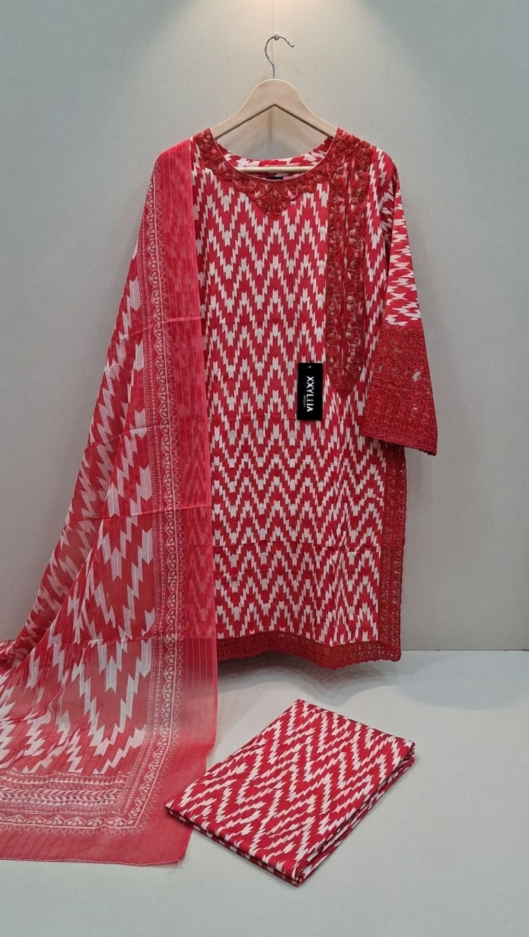 Red and white patterned kurta with matching dupatta on a hanger against a white background