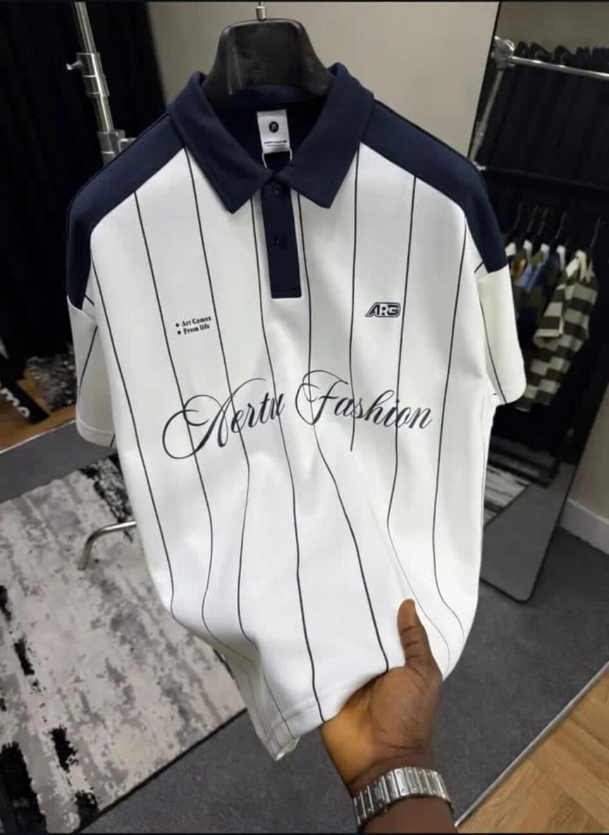 White polo shirt with black stripes and 'Aerts Fashion' branding on a hanger.