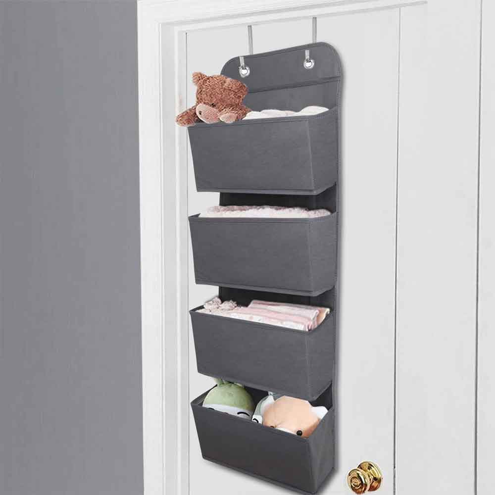 Gray over-the-door storage organizer with toys hanging on a door.