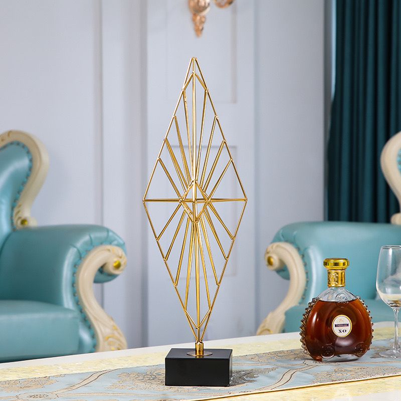 Top view flat lay of luxury home decor items on a light marble surface with ceramic vase, linen cloth, candle, wooden tray,