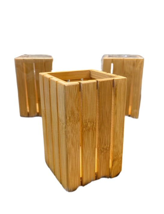 Three wooden planters with a natural finish on a white background