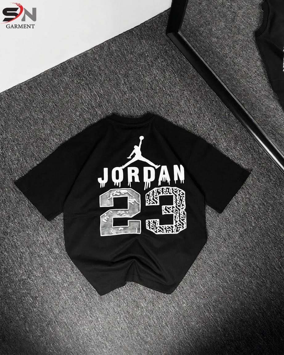 Black t-shirt with Jordan 23 design on a textured surface