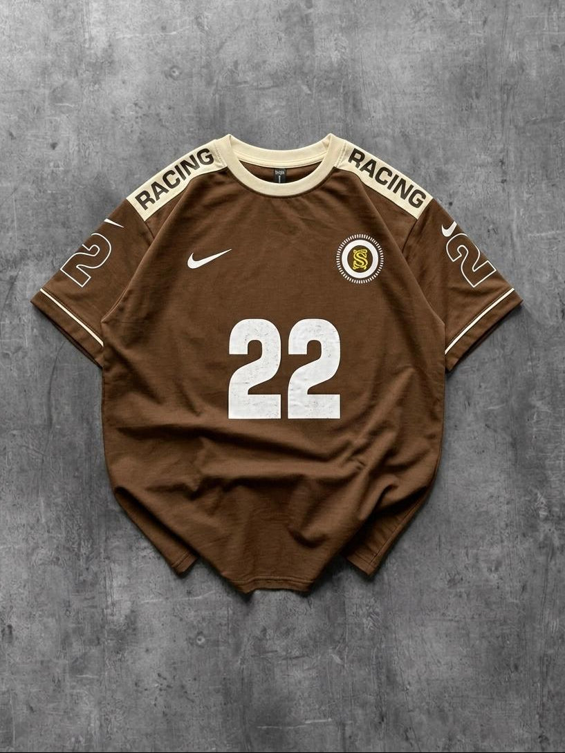 Brown sports jersey with number 22 and 'Racing' branding on a gray background