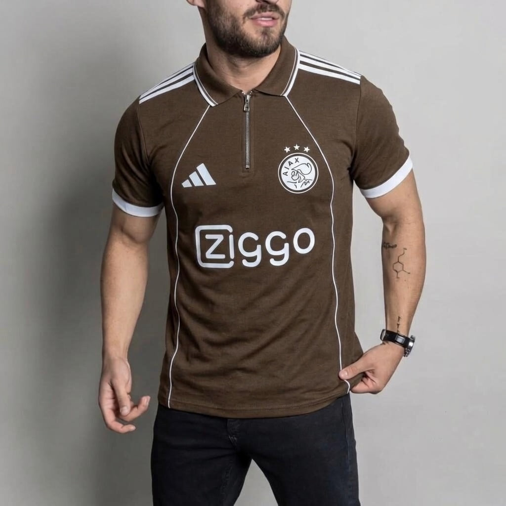 Man wearing a brown sports jersey with Adidas and Ziggo logos on a gray background
