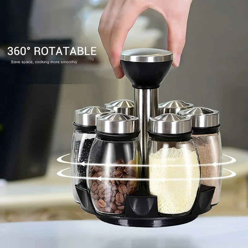 360-degree rotatable spice rack with jars containing various spices, held by a hand.