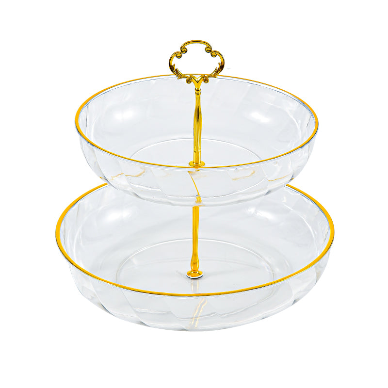 Two-tiered clear glass stand with gold trim on a white background